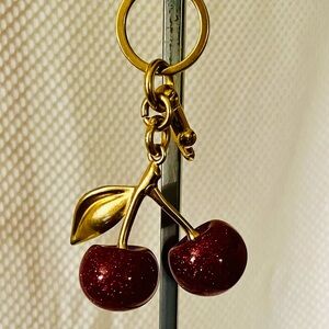 Sparkling Cherry Keychain with Gold Details